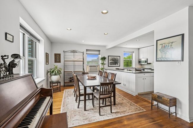 Dining room featuring recessed lighting, wood finished floors, and cooling unit | Image 10