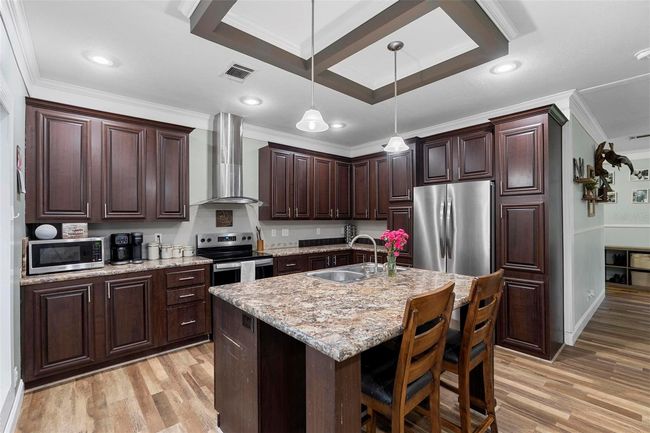 Stainless steal appliances in the large kitchen | Image 12