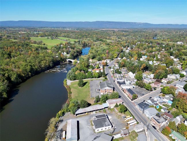 Aerial view featuring a forest view and a water view | Image 23