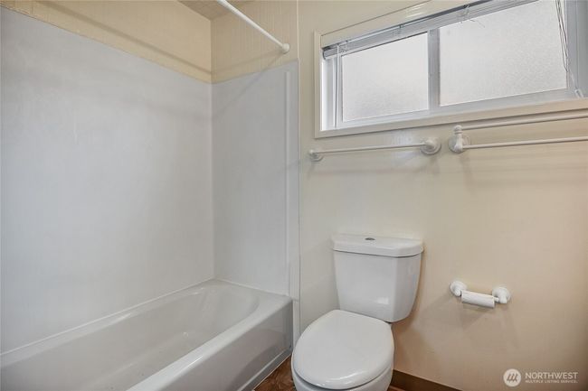 The second bedroom also includes a full en-suite bath. | Image 20