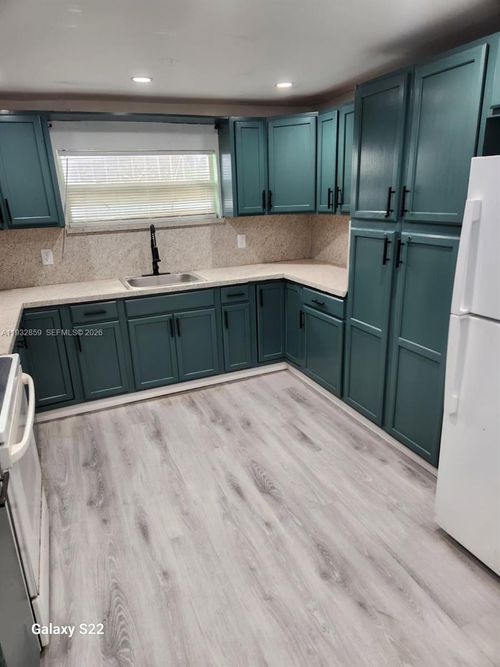 1040 Curtiss Dr, Opa-Locka, FL, 33054-3020 | Card Image