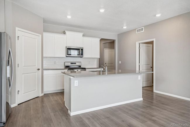 1572 Illingworth Dr, House other with 3 bedrooms, 2 bathrooms and 3 parking in Windsor CO | Image 11