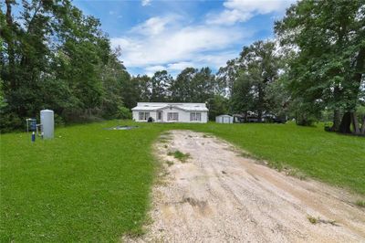 335 County Road 3892, House other with 3 bedrooms, 2 bathrooms and null parking in Cleveland TX | Image 3