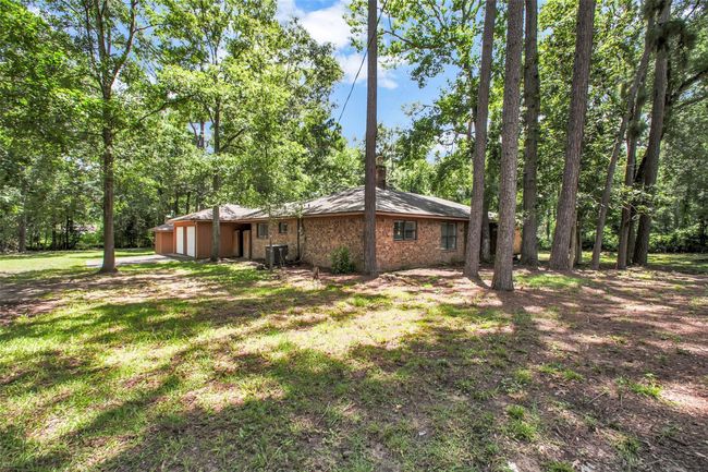 Spanning .71 acres, this private outdoor space is ready to be transformed into your personal oasis, with room for entertaining, relaxing, or expansion. | Image 31