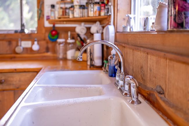 Kitchen now has new concrete counter tops and new sink | Image 15