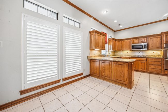 Great eat in kitchen with lots of storage. | Image 17