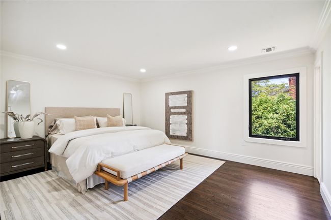 Bedroom with ornamental molding, wood finished floors, and recessed lighting | Image 19