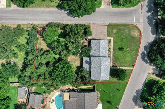 Aerial view of home on almost a half-acre corner lot. | Image 32