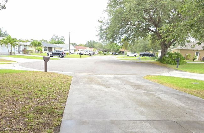View of concrete surface featuring a residential view | Image 35