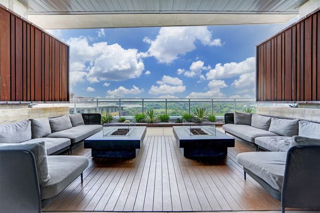 Deck featuring an outdoor living space with a fire pit | Image 17