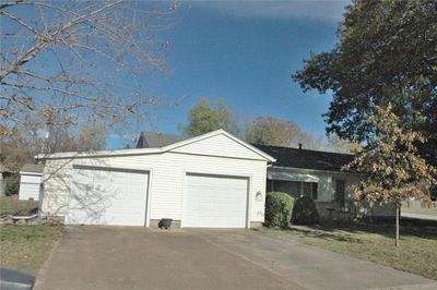 View of front of home with a garage | Image 1