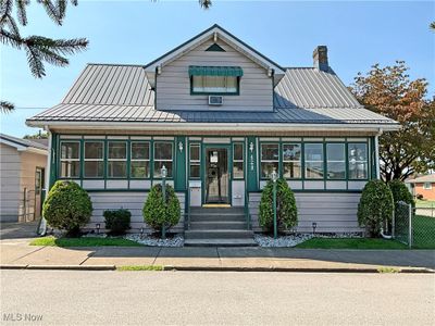 View of front of property featuring a porch | Image 1