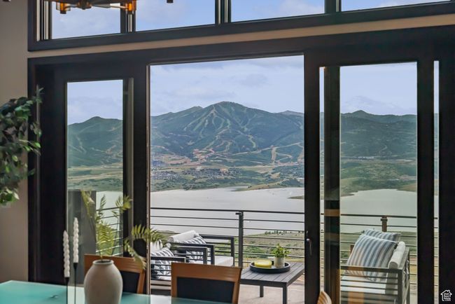 Mountain view featuring a large body of water | Image 5