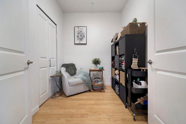 Living area with light wood-style flooring | Image 21