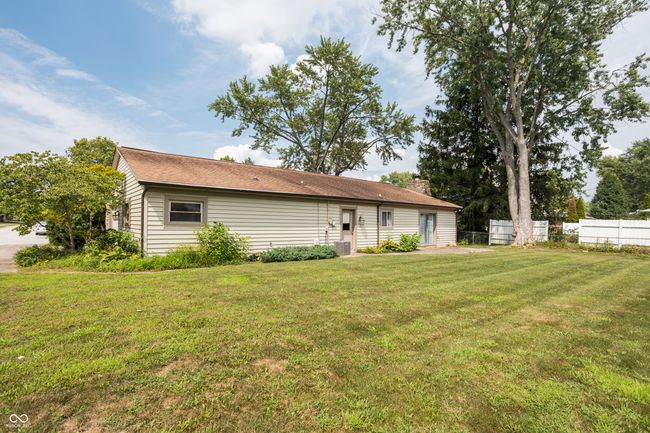back of house with a chimney | Image 35