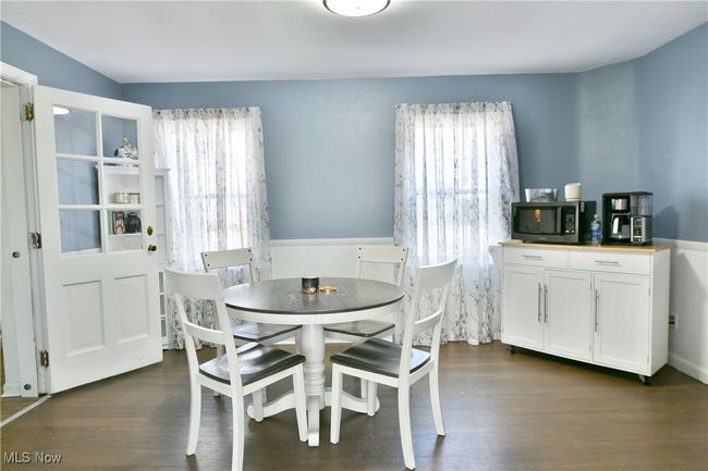 Dining room with dark wood-style floors | Image 25