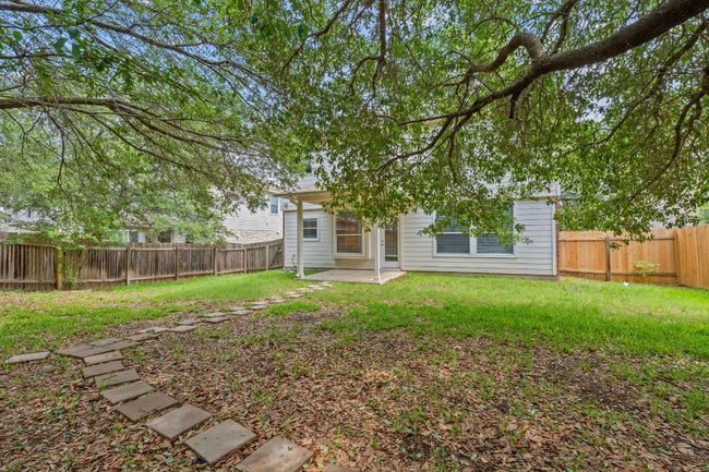 Rear view of property featuring a patio area | Image 32