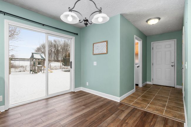 Eat in Kitchen with door wall to back of home. | Image 8
