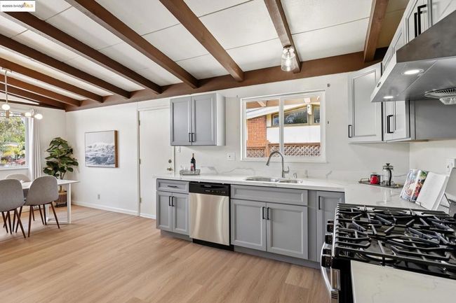 Stylish kitchen with sleek gray cabinetry | Image 15