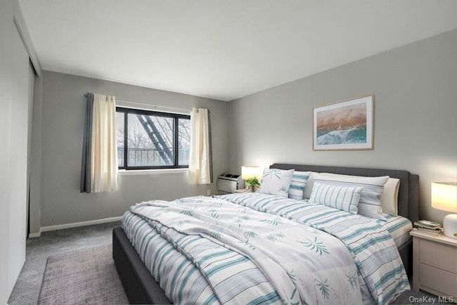 Bedroom with baseboards and carpet | Image 25