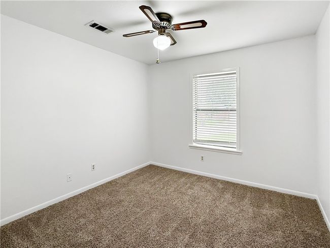 Spare room featuring carpet flooring and ceiling fan | Image 14