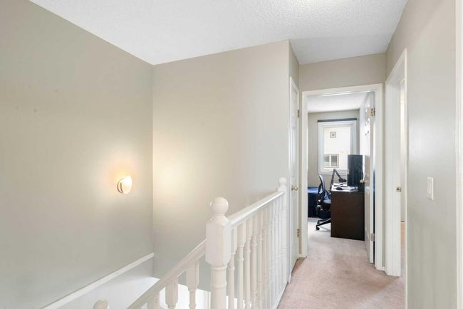 219 Coachway Lane Sw, Townhouse with 3 bedrooms, 3 bathrooms and 2 parking in Calgary AB | Image 21