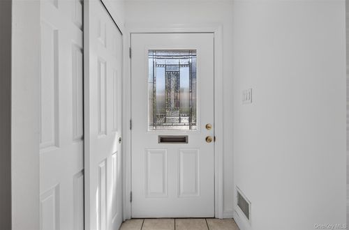 84-23-30A Corporal Kennedy Street, New York, NY, 11360 | Card Image