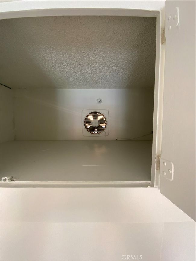 Built in fan from closest to kitchen to move cold air from AC unit | Image 24