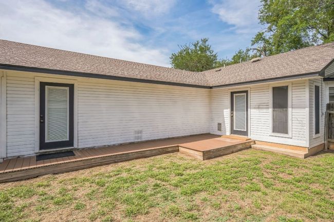 Back of house featuring a wooden deck | Image 29