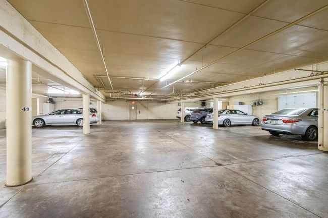 Attached, Heated, Secured, Drive Under Garage - 2 spaces | Image 25