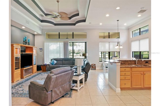 Combination family room, & kitchen. | Image 7