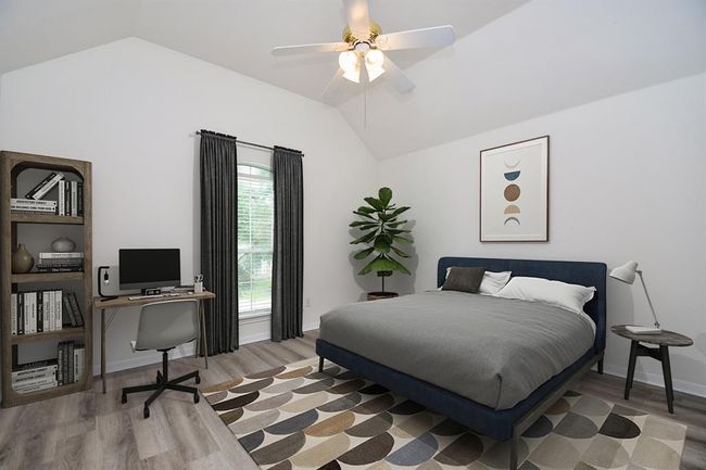 Moving through, bedroom #3 measures 12' x 13', complete with vaulted ceilings, a large window to let in light and spacious closet. Plenty of room to add a study area for your teen! | Image 31