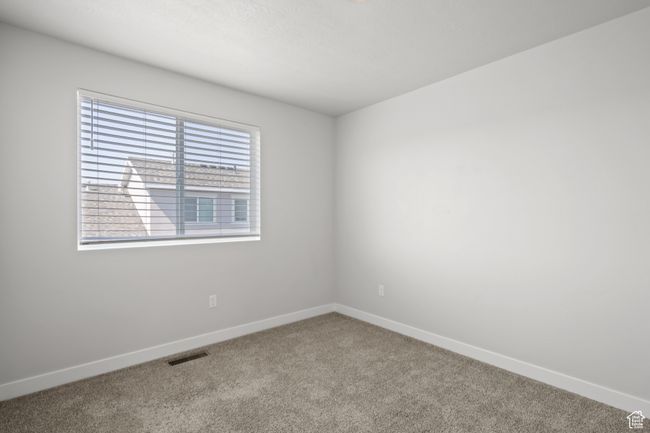 Spare room with carpet and baseboards | Image 29