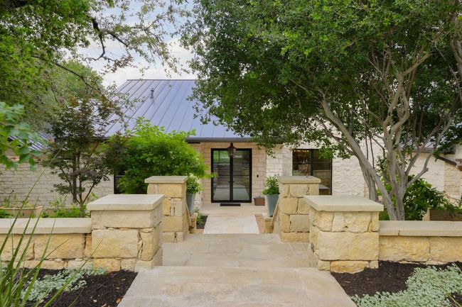 View of front of home featuring a standing seam roof and a metal roof | Image 4