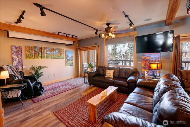 Take a seat and hang out, you are in Twisp now. We are all neighbors. A cozy space to spread out a little further in the winter time when the decks are chilly. | Image 40
