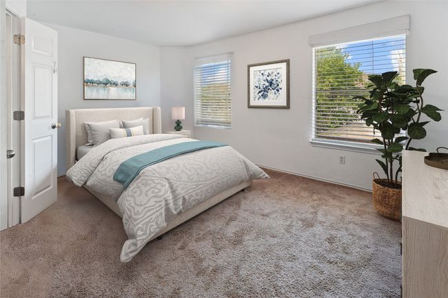 Primary bedroom has been virtually staged. Bedroom does have a ceiling fan. | Image 7