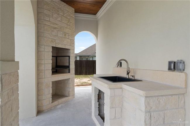 Backyard ViewsCozy dining outdoors showcasing views of the covered patio and backyard. | Image 38