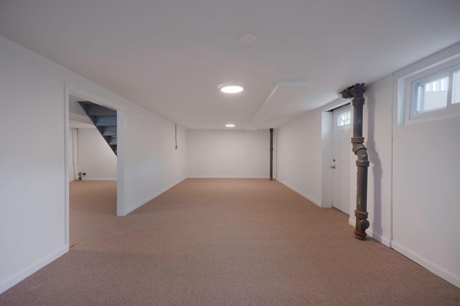 Basement with carpet | Image 19