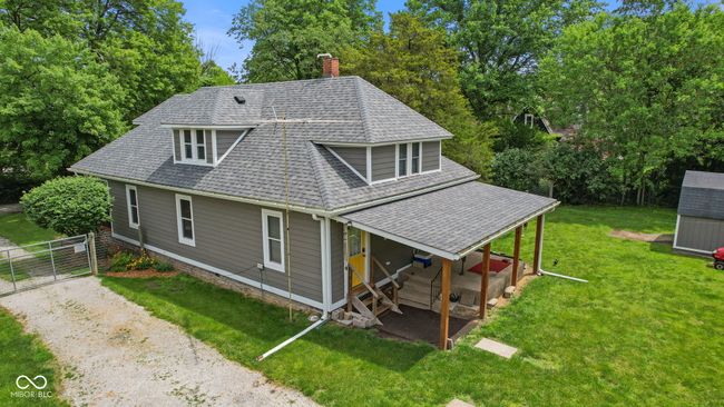 This huge very old tree is to the west of the driveway leading back to the garage and more than 3 acres beyond the gate. | Image 7