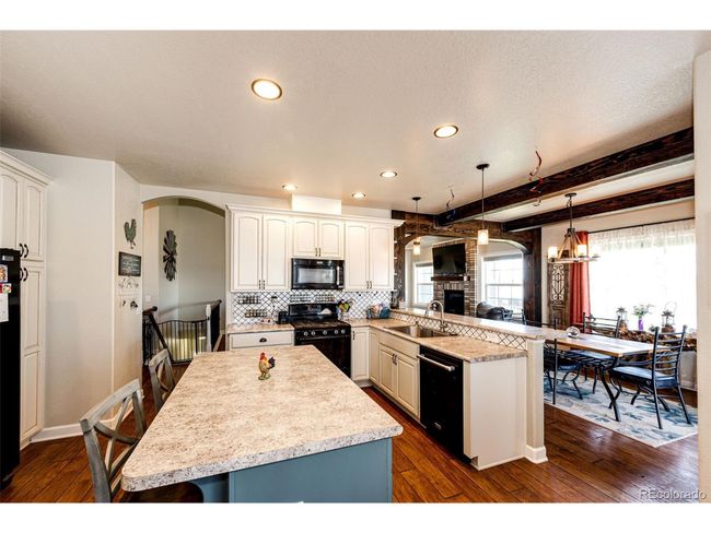 59466 E Commanche Way, House other with 3 bedrooms, 3 bathrooms and null parking in Strasburg CO | Image 11