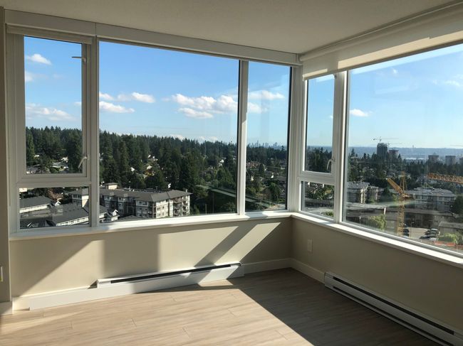 Unfurnished sunroom with a baseboard heating unit | Image 16