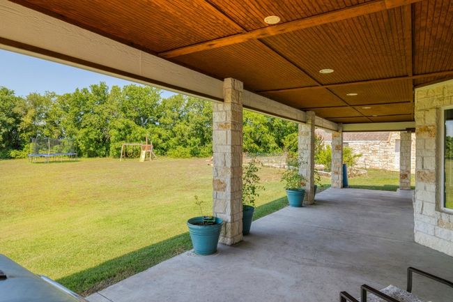 Covered back patio. | Image 30