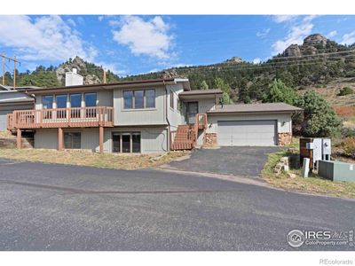 Side of house- Hot Tub on the left side of home on deck | Image 2