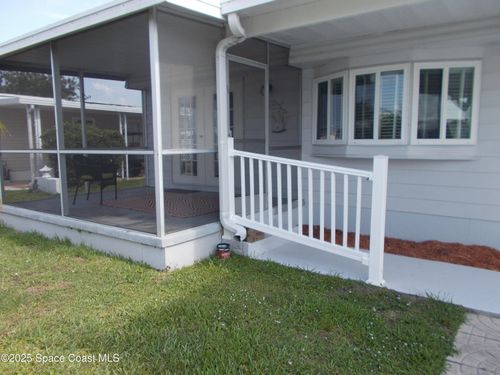 947 Laurel Cir, Barefoot Bay, FL, 32976-7298 | Card Image
