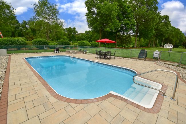Summer just got a lot cooler with this beautiful in ground pool | Image 37