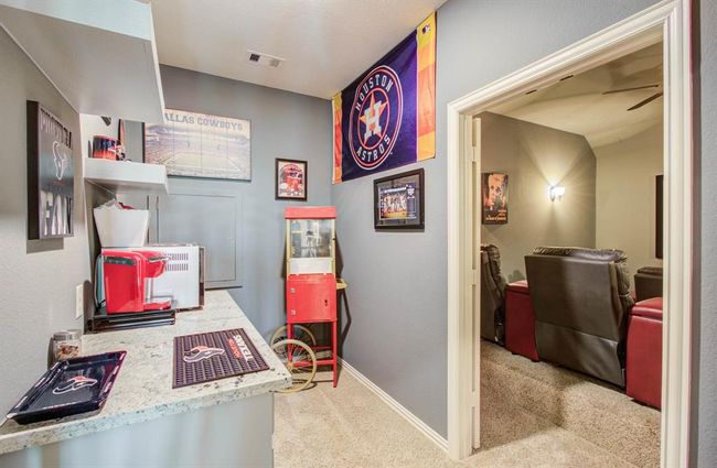 Cute bar area as you enter the home theater. | Image 23