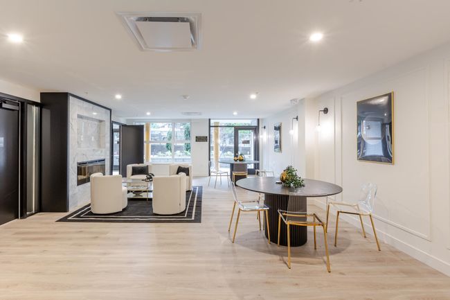 Dining room with a premium fireplace, light wood-type flooring, and recessed lighting | Image 19