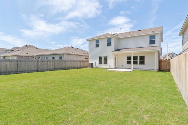 Back of house with a patio and central air condition unit | Image 32