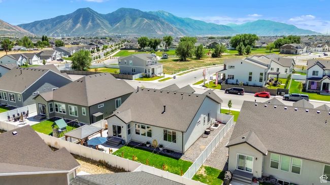 Aerial perspective of suburban area with a mountainous background | Image 35