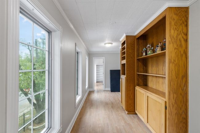 2nd floor Bedroom 6 sunroom/hallway and walk-in closet | Image 34